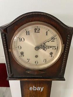 Antique Grandfather clock still chimes see video