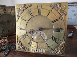 Baddely of Tong 11 inch brass dial with movement